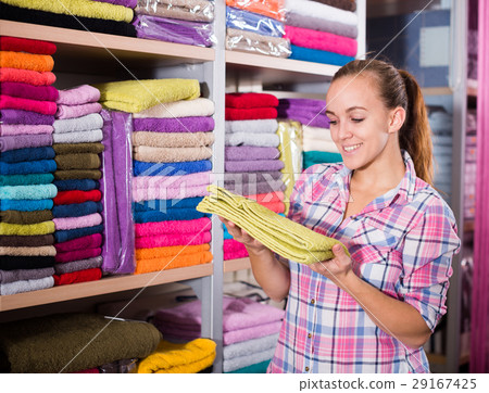 Woman choosing towels 29167425