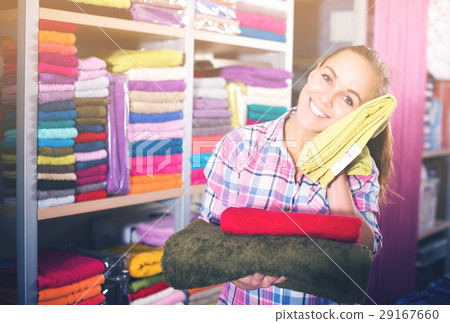 Woman choosing towels 29167660