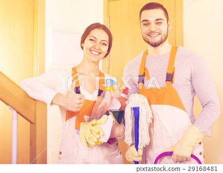 cleaners cleaning in room cleaners cleaning in room 29168481
