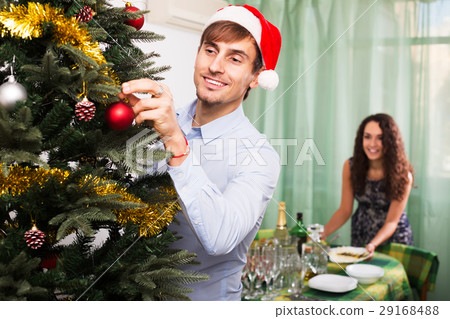Couple preparing for celebrating Christmas 29168488