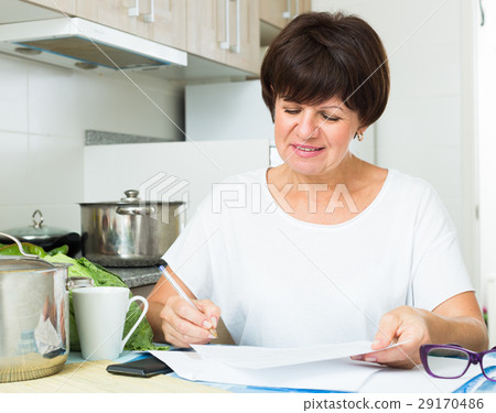 happy woman paying bills happy woman paying bills 29170486