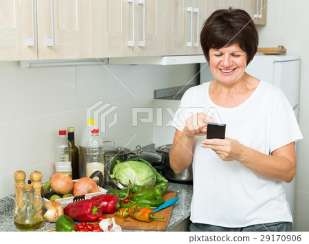 senior woman looking phone senior woman looking phone 29170906