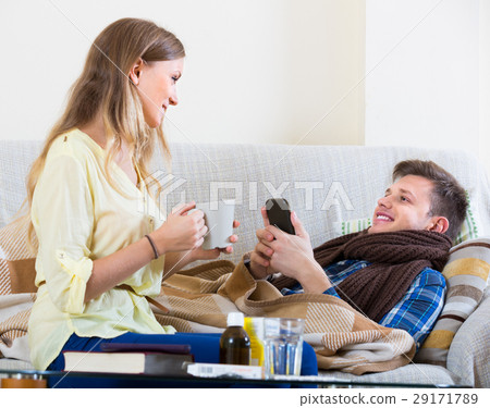 sick guy with flue and nursing girl sick guy with flue and nursing girl 29171789