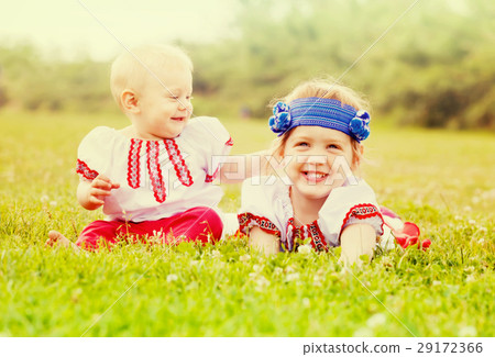 children in folk clothes in summer children in folk clothes in summer 29172366