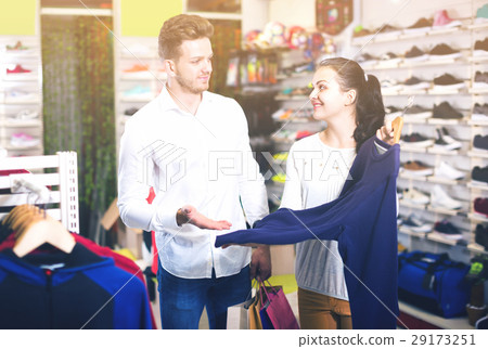 Couple deciding on new sportswear 29173251