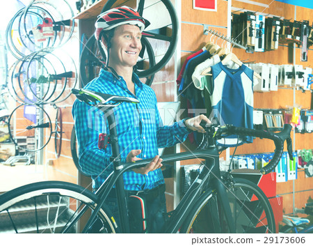 Man buying new racing bicycl Man buying new racing bicycl 29173606