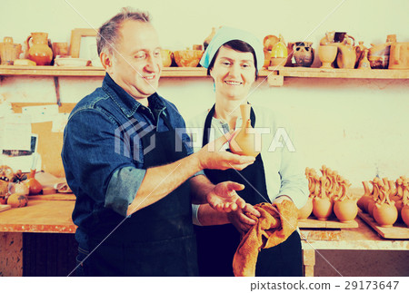 Couple among the pottery 29173647