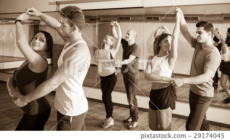 Laughing adults dancing bachata 29174045