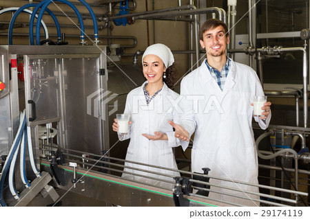 man and woman working on factory 29174119