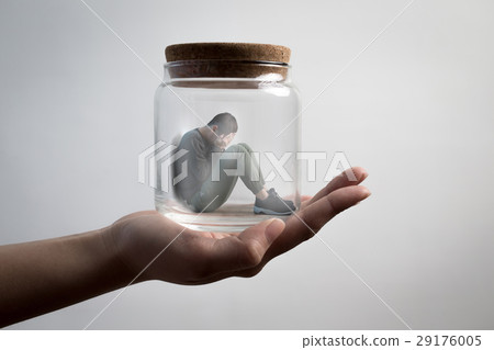 man sit in jar 29176005