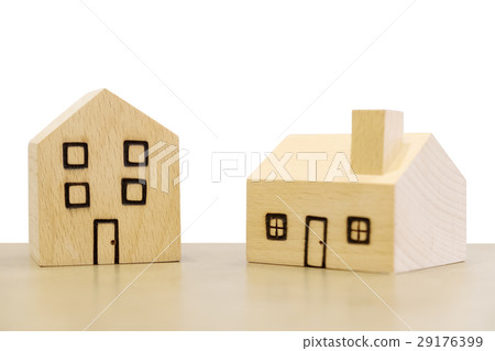 Miniature wooden houses on white background. Miniature wooden houses on white background. 29176399