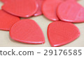 Macro picture of red guitar pick 29176585