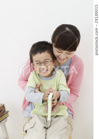 Mother and son with a book Mother and son with a book 29180015
