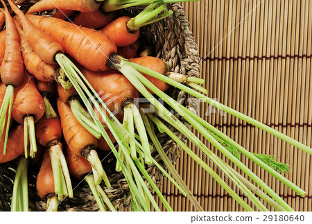 carrots close up on wood background carrots close up on wood background 29180640