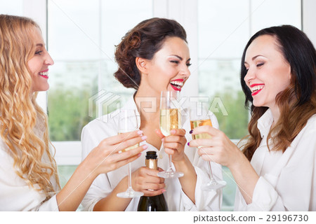 Bride to be and bridemaids with champagne Bride to be and bridemaids with champagne 29196730