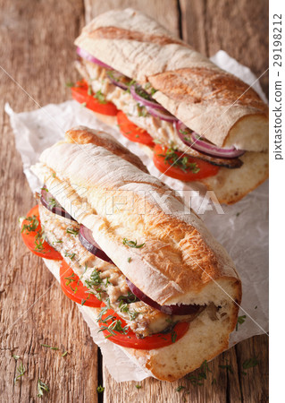 Sandwiches with fried mackerel and vegetables 29198212