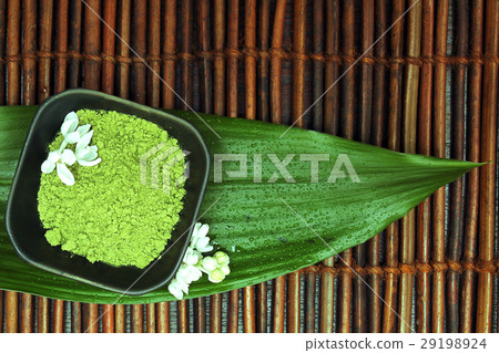 Spa background. White flower, green spa mud Spa background. White flower, green spa mud 29198924