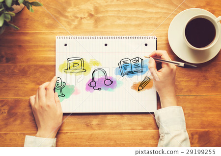 E-Learning with a person holding a pen 29199255