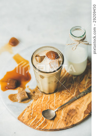 Iced caramel latte coffee cocktail with milk and Iced caramel latte coffee cocktail with milk and 29209450