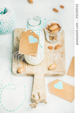 Fresh vegetarian dairy-free almond milk with copy Fresh vegetarian dairy-free almond milk with copy 29209502