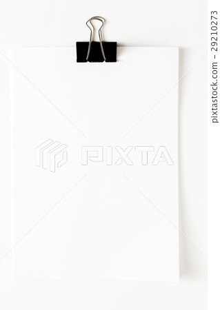 Blank paper sheet attached with clip isolated on 29210273
