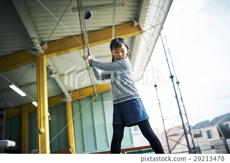 Girls practicing golf Girls practicing golf 29213478