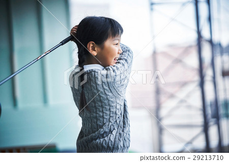 Girls practicing golf Girls practicing golf 29213710