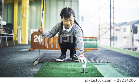 Girls practicing golf 29214200