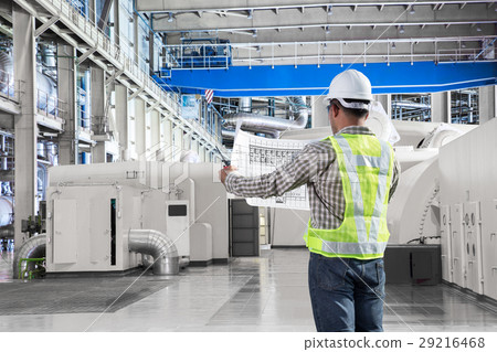 Engineer reading drawing diagram in factory 29216468