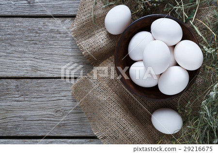 Fresh chicken brown eggs on sack, organic farming Fresh chicken brown eggs on sack, organic farming 29216675
