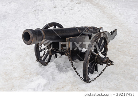 Old gun on snow background 29217455