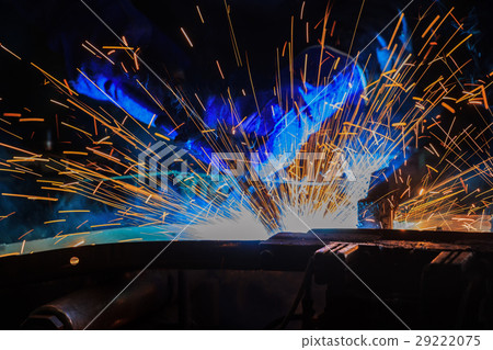 Close up welder is welding automotive part. Close up welder is welding automotive part. 29222075