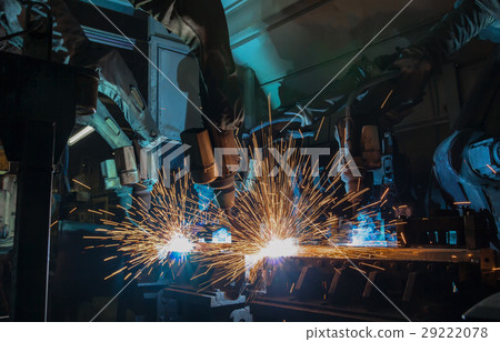 Team robots welding are welding automotive part Team robots welding are welding automotive part 29222078