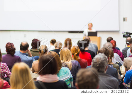 Woman giving presentation on business conference. Woman giving presentation on business conference. 29223222