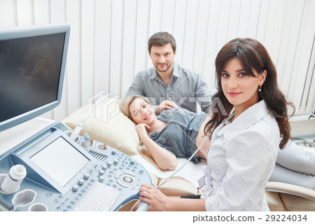 Young couple expecting of child and diagnosing in Young couple expecting of child and diagnosing in 29224034