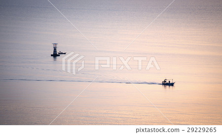 silhouette sunrise of fishery boat sail calm sea  29229265