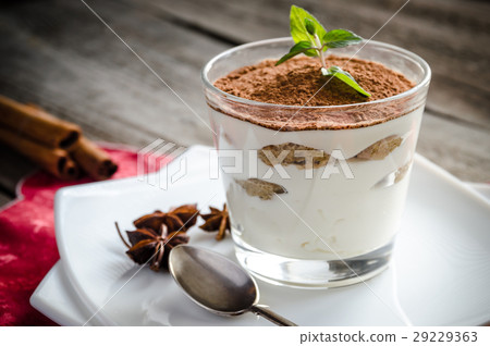 Tiramisu in the glass on the wooden background 29229363