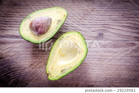 Avocado on the wooden background Avocado on the wooden background 29229561