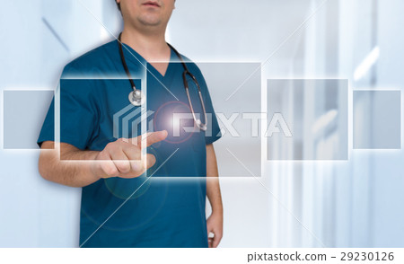 Doctor pointing at futuristic touchscreen template concept Doctor pointing at futuristic touchscreen template concept 29230126