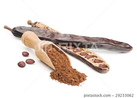 Carob powder and pods isolated on white Carob powder and pods isolated on white 29233062