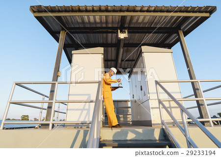Engineers checking solar panels, Solar Energy  Engineers checking solar panels, Solar Energy  29233194