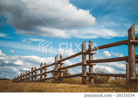 wooden rustic fence in village and blue sky 29233554