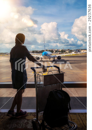 lady waiting air fright in air port 29237636