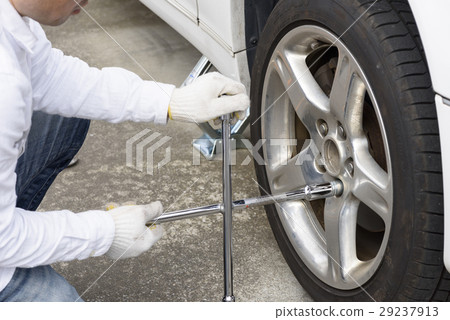 Car tire replacement work 29237913