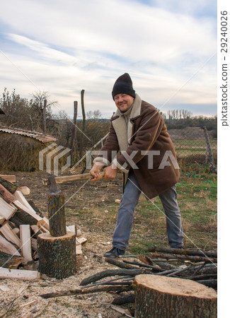 man chopping wood in the village man chopping wood in the village 29240026