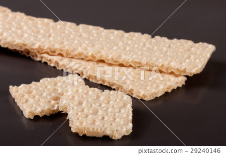 two grain crispbreads on a dark background two grain crispbreads on a dark background 29240146