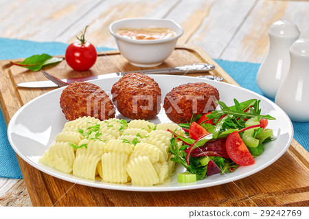 mashed potato, cuttlets and salad 29242769