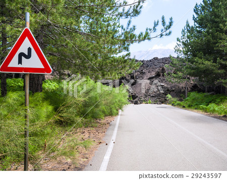 hardened lava flow closed road on slope of Etna 29243597