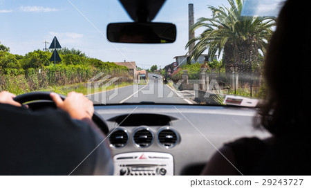 driving a car in rural region in summer 29243727