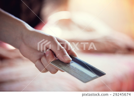 hand holding credit card hand holding credit card 29245674